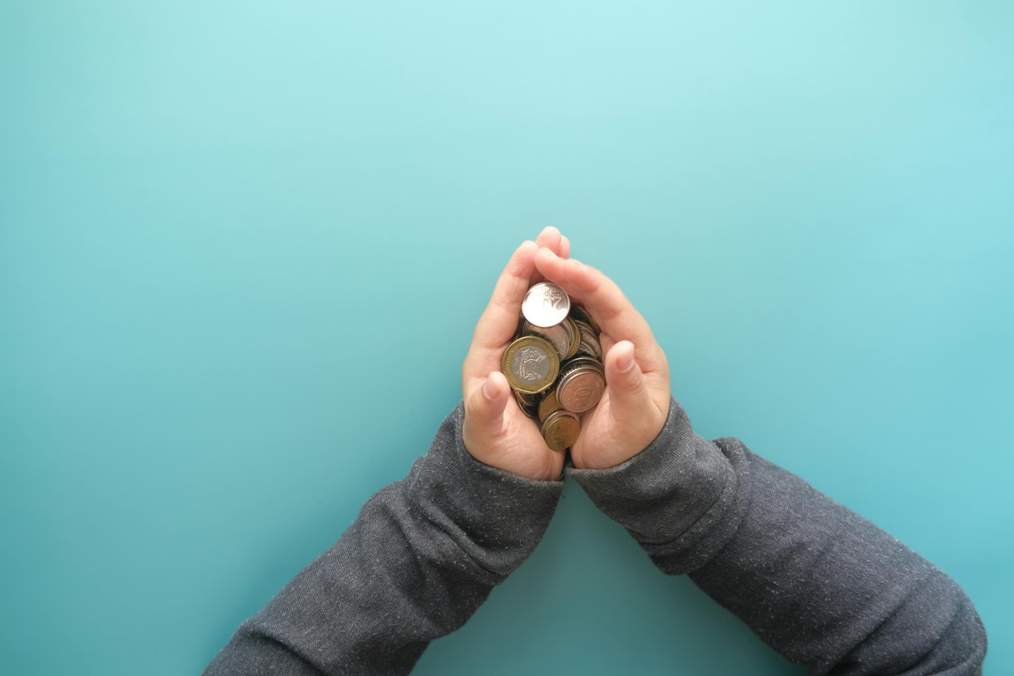 Coins in hands
